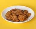 Antioxidant Health Bars on a white plate on a yellow background