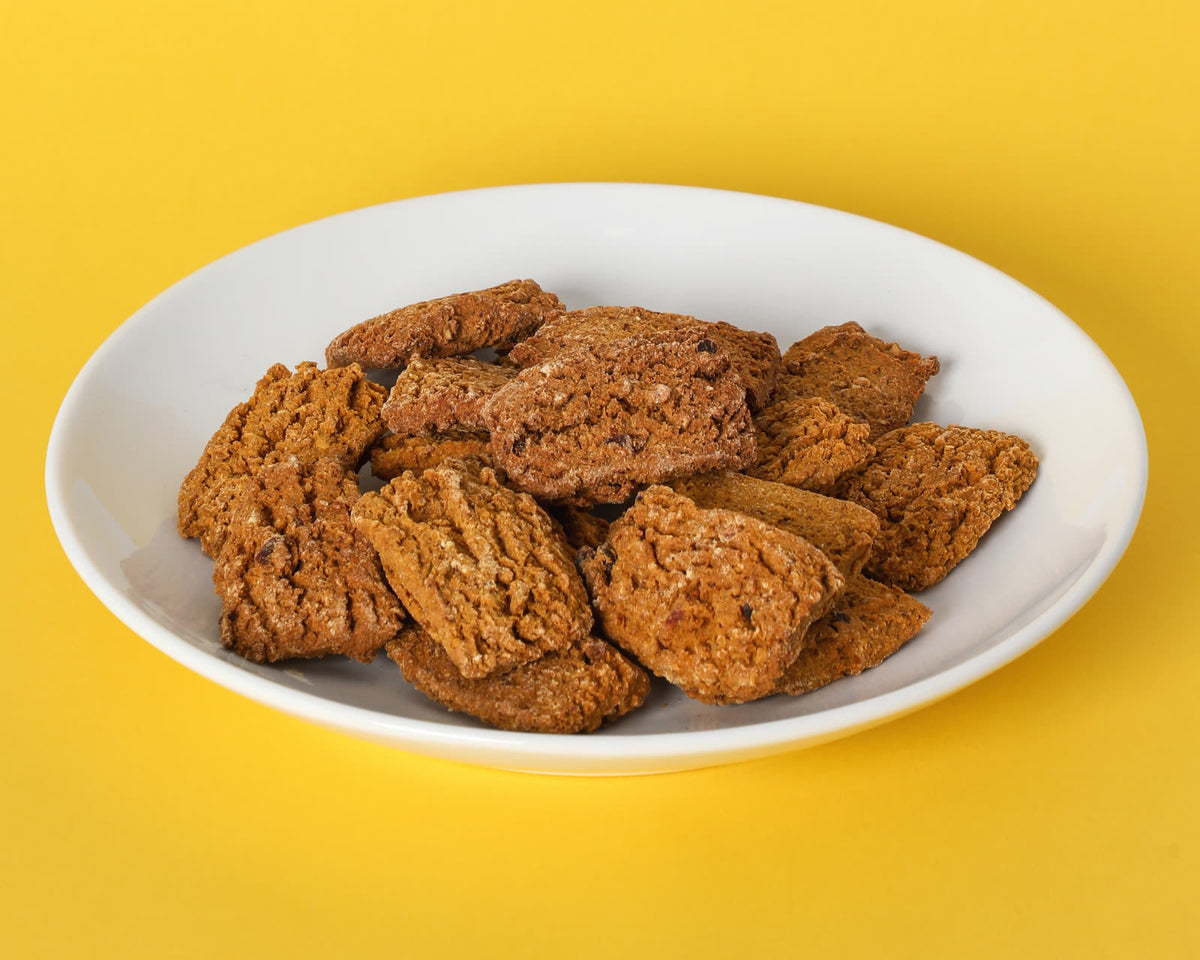 Antioxidant Health Bars on a white plate on a yellow background