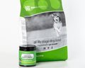 Daily Nutrition System for dogs: bag of All Life Stage food with its Companion Supplement chews jar on a white studio background