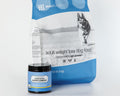 Daily Nutrition System: bag of adult weight loss dog food with its Companion Supplement chews jar on a white studio background