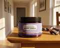 Companion Supplement for Large Breed Puppy Food jar on an oak table beside a rope toy