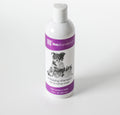 Revitalizing Shampoo 12 oz bottle photographed at an angle on a white studio background